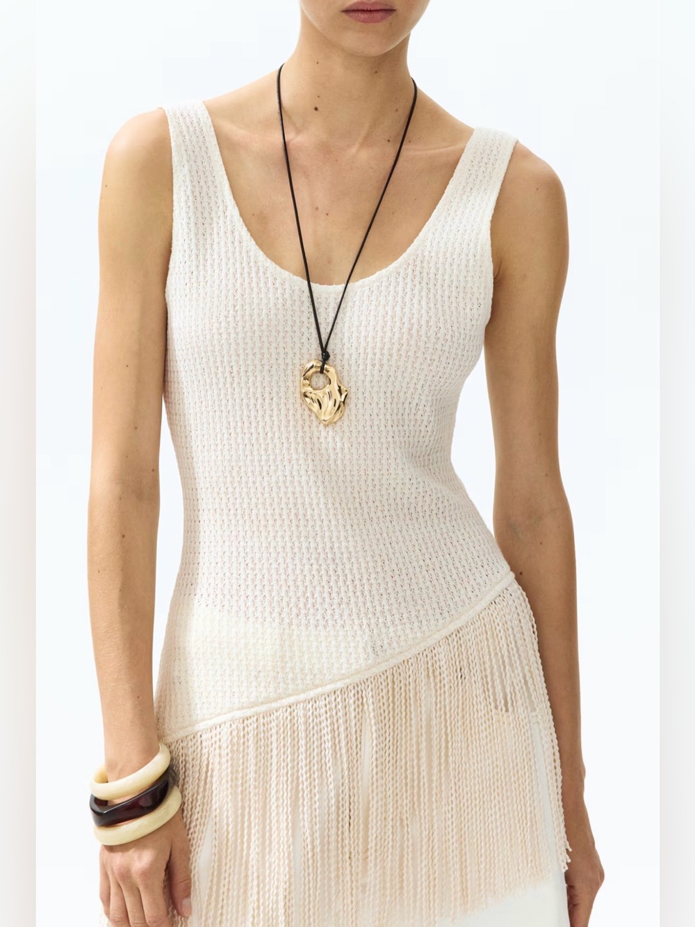 asymmetric fringe-trimmed top